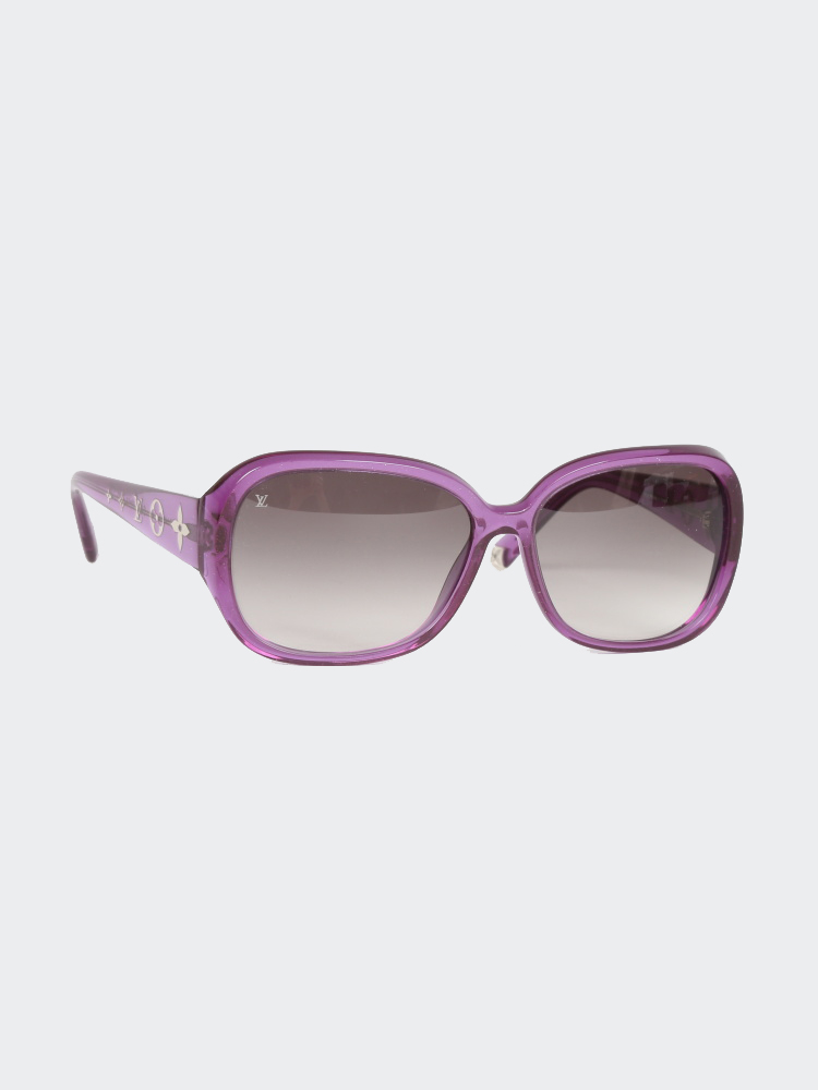 Violet translucent Louis Vuitton Obsession square sunglasses with tinted  lenses and monogram at arms.